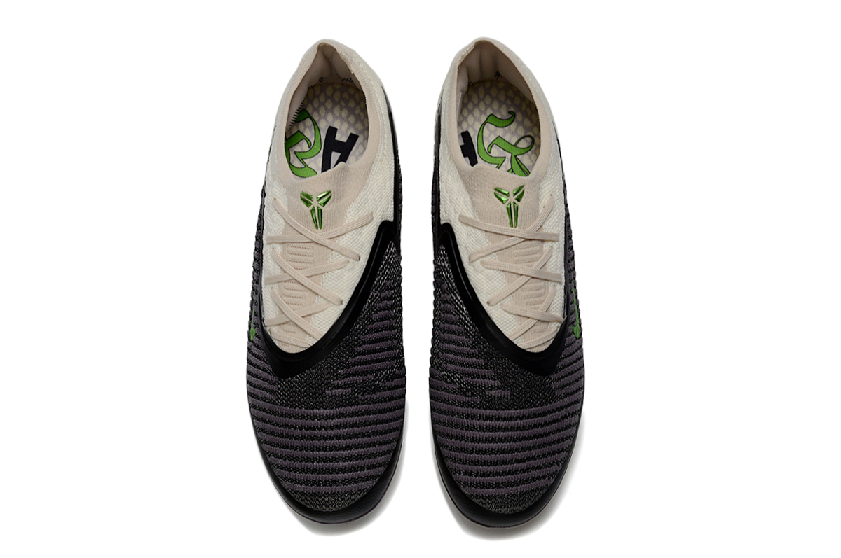 Kobe Bryant x Nike Phantom 6 Low Elite FG SE soccer cleats in Phantom and Black with Nike branding and textured upper.