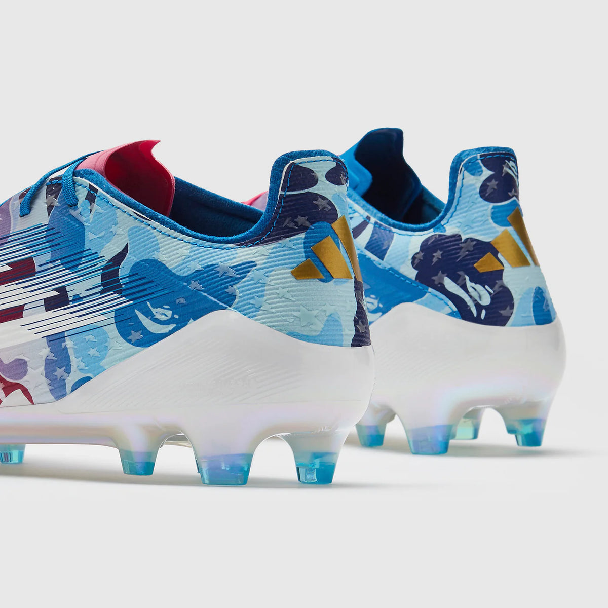 WorldClassCleats F50 Elite FG X BAPE soccer cleats with black and white design, featuring BAPE branding and studded outsole for firm ground.