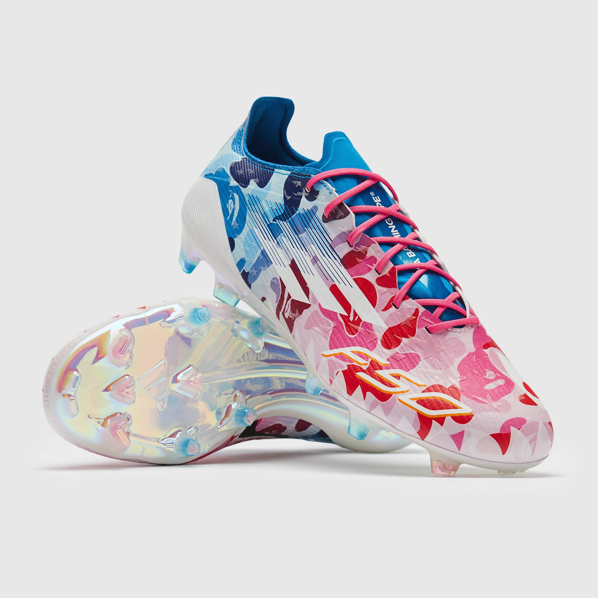 WorldClassCleats F50 Elite FG X BAPE soccer cleats featuring a sleek design and vibrant graphics on a white background.