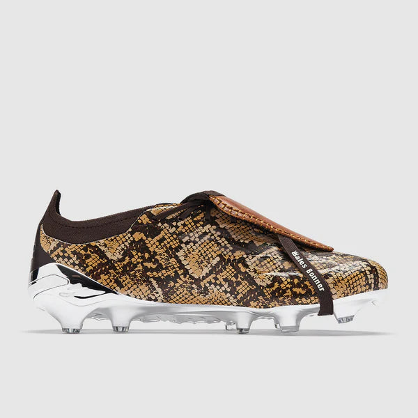 adidas Predator Elite Tongue soccer cleats in black with white accents, designed for optimal grip and performance on firm ground.