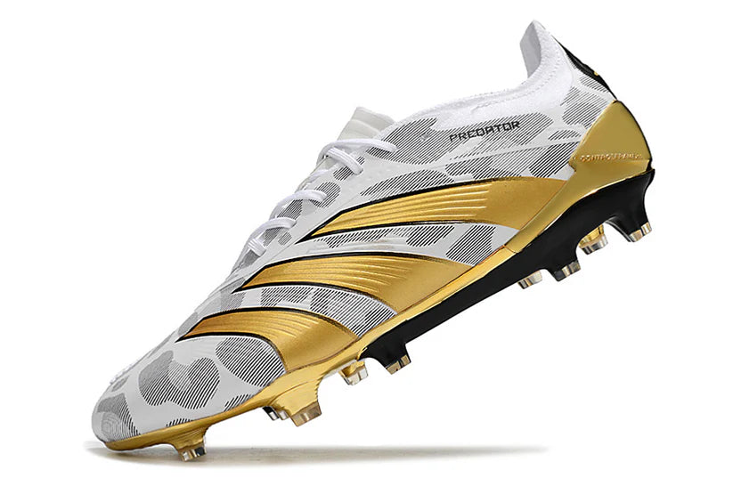 Adidas Predator x Elite FG limited soccer cleats in black and white with textured upper and firm ground studs for outdoor play