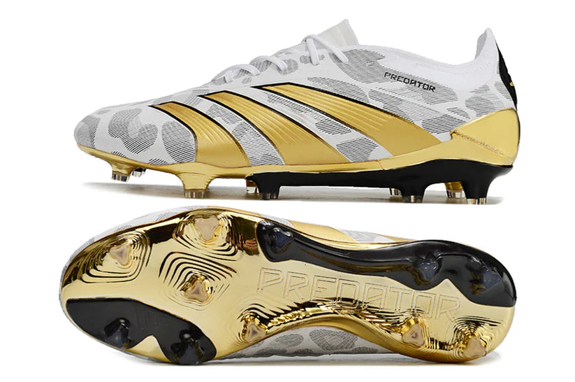 Adidas Predator x Elite FG soccer cleats in black and red with textured upper and firm ground studs for outdoor play.