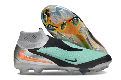 Nike Phantom 6 Elite high cut soccer cleats in turquoise, chrome, and black with textured details and firm ground studs.