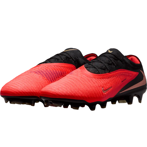 Nike Phantom 6 Low Elite FG soccer cleats in vibrant Aurora color, featuring lightweight design and textured upper for optimal ball control.