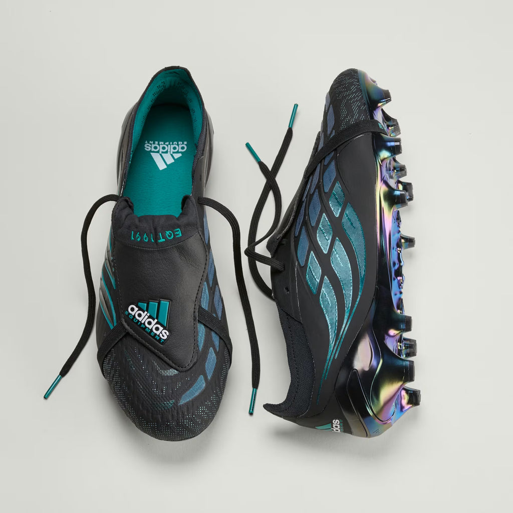 Black adidas Predator Elite EQT FT FG soccer cleats with fold-over tongue and firm ground studs, designed for precision and control.