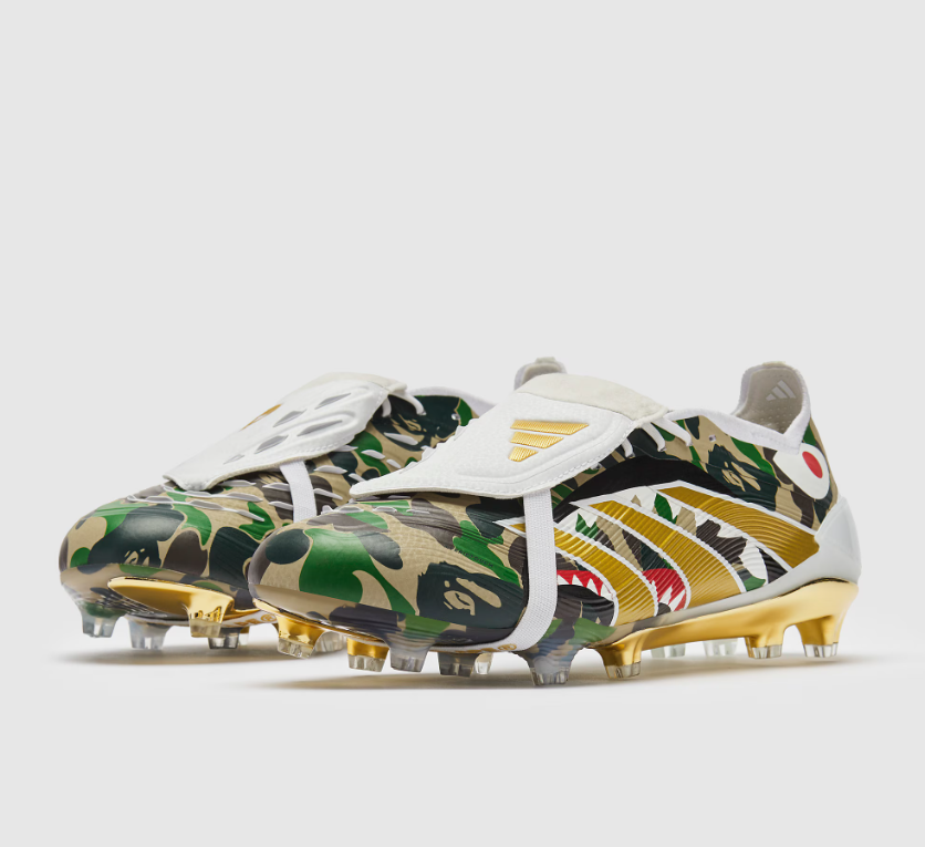 WorldClassCleats Predator Elite FG X BAPE soccer cleats with black and green design, featuring textured upper and studded sole.