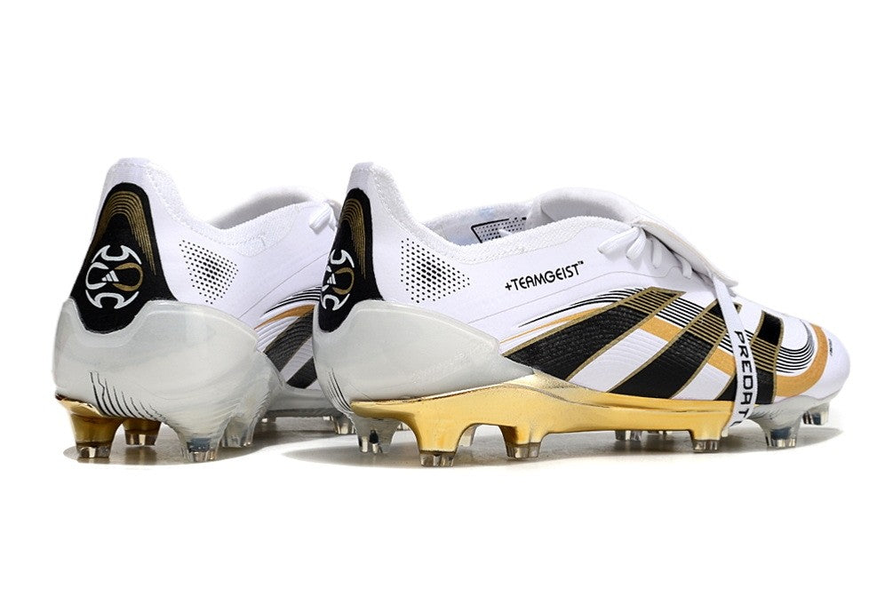 White and black Adidas Predator Teamgeist Pack Elite FG soccer cleats with metallic gold accents, designed for optimal performance on firm ground.