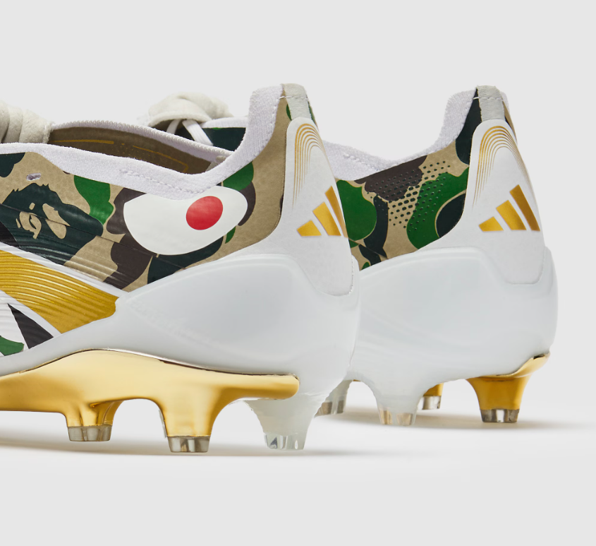 WorldClassCleats Predator Elite FG X BAPE soccer cleats with sleek design and vibrant branding, suitable for professional play.