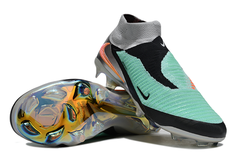 Nike Phantom 6 Elite high cut soccer cleats in turquoise, chrome, and black with Nike branding and textured upper design.