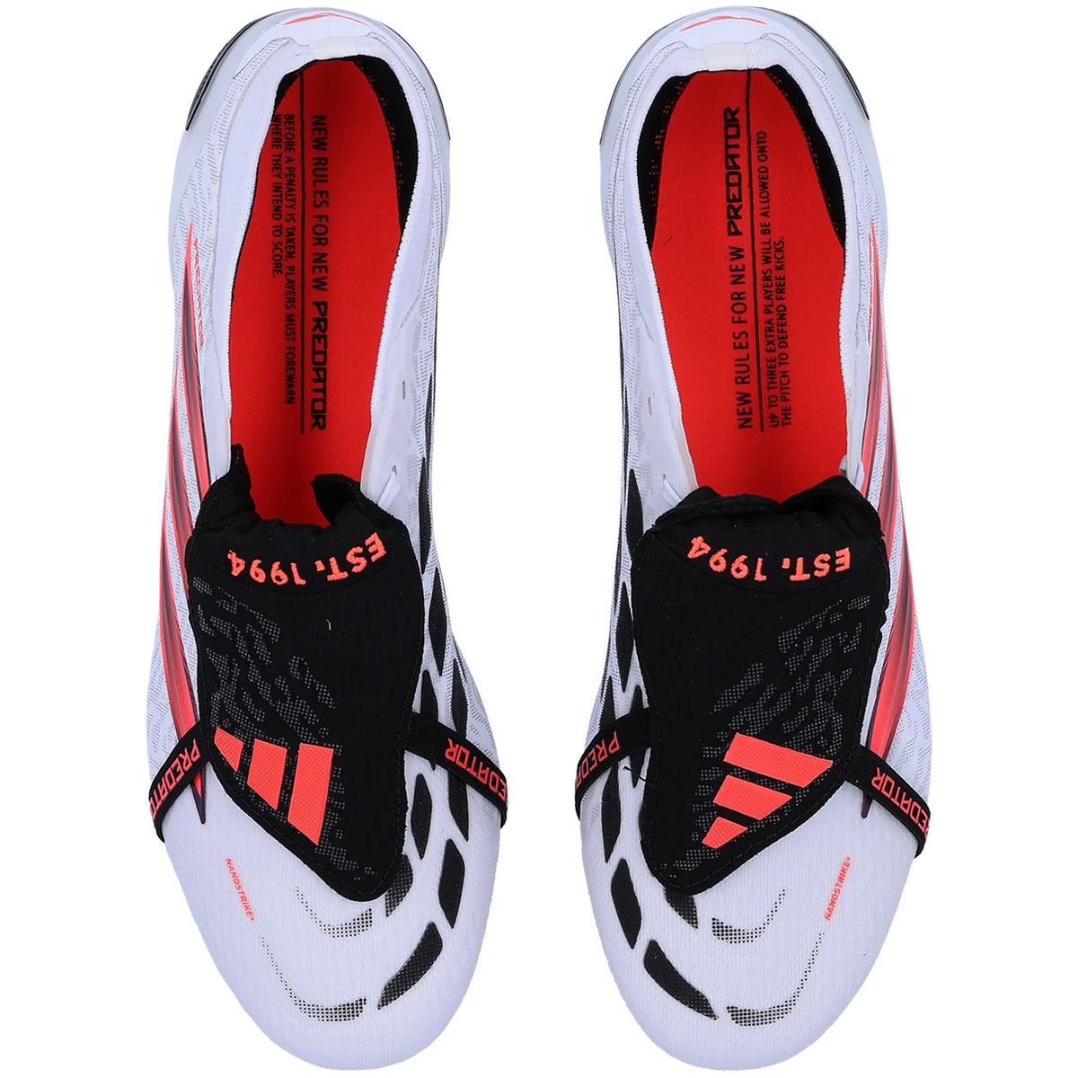 adidas Predator Elite FT FG white and black soccer cleats with solar turbo accents, designed for optimal grip and performance.